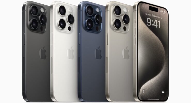 iPhone 15 Pro in black titanium, white titanium, blue titanium, and natural titanium finishes.